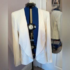 White cutaway blazer with tailoring details. Lafayette 148.
